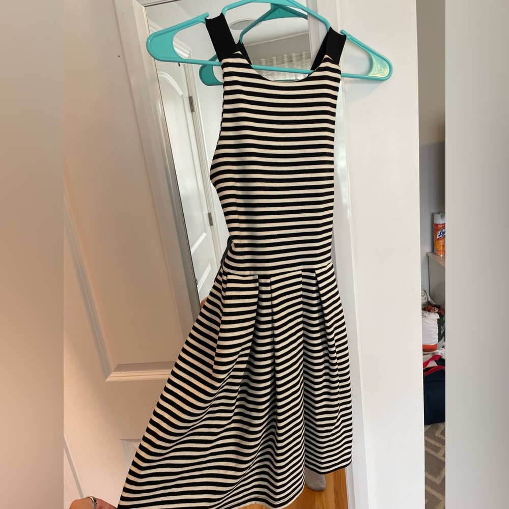 Black and white striped dresses. Stretchy straps. Juniors size M.